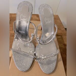 CHRISTIAN LOUBOUTIN
Just Queen 100 crystal-embellished PVC mules